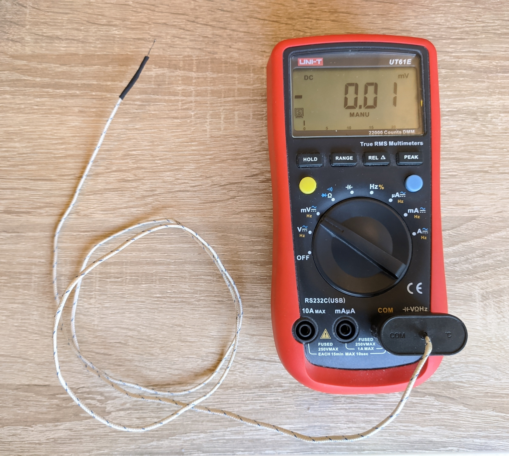 UT61E with thermocouple plugged in